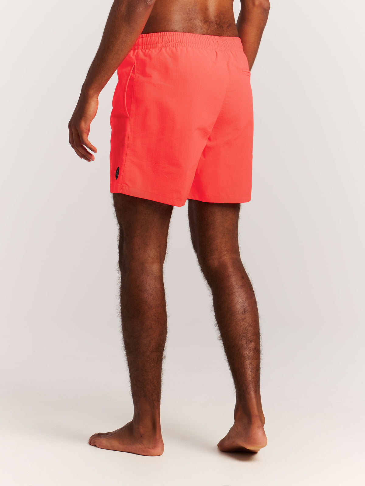 PROTEST FASTER Beachshort | Neon Pink